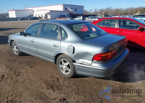 1999 Toyota Avalon Xls z USA, uszkodzony, nr VIN 4T1BF18B6XU303172